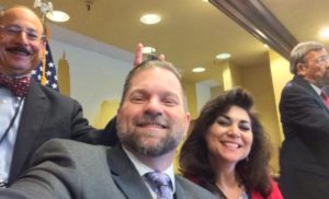 Photo bombed and bunny eared by Alan Gottlieb, sitting next to Cheryl Todd while Massad Ayoob speaks at the 2016 GRPC